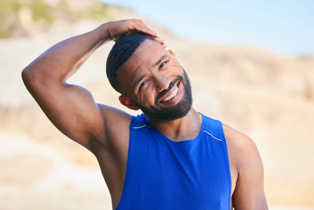 happy man portrait and stretching neck in fitness utc